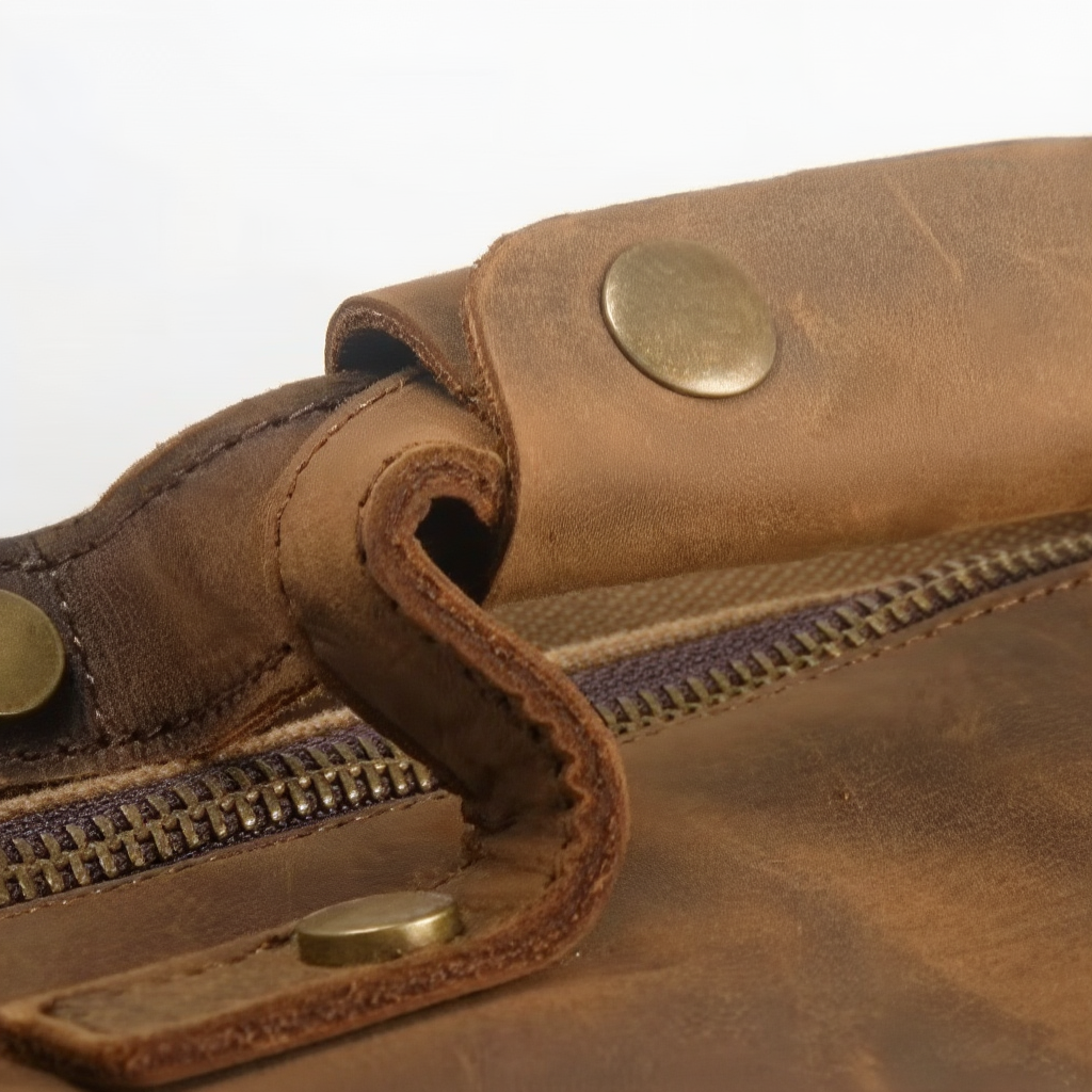 sac-de-voyage-homme-en-toile-et-cuir-bagage-cabine-chic-marron-zoom-sur-poignee